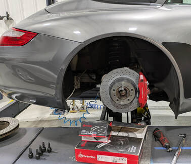 2007 Porsche 911 Carrera S Rear Brakes Being Serviced with Genuine Brembo Parts -- BAAS European Auto Service, Owner‑Led in Northern NJ 