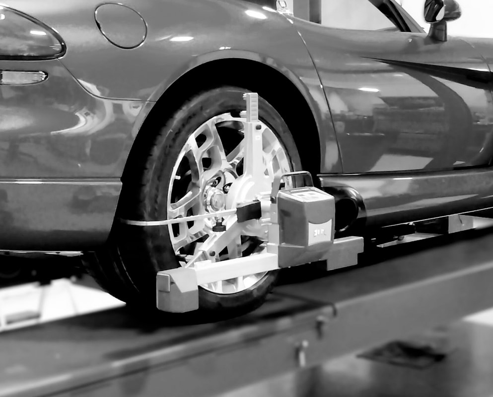 2008 Dodge Viper SRT-10 Having a Precision Wheel Alignment Performed After Installation of New Tires -- BAAS European Auto Service, Owner‑Led in Northern NJ
